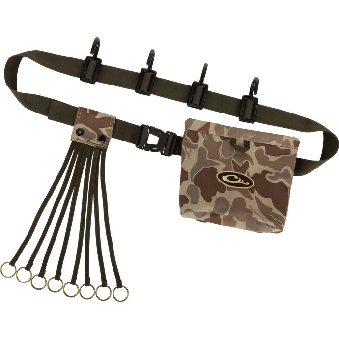 Alt text: The Ultimate Timber Strap by Drake Waterfowl, featuring a camouflage bag with logo, adjustable tree strap, Spring-Open™ shell pouch, and metal hooks for hunting gear organization.
