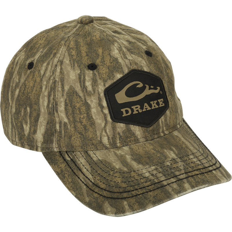 Camo Cotton Twill Hex Patch Cap - A low-profile hat with a black logo, perfect for any adventure. Breathable and durable, with unstructured front panels and a secure hook and loop closure. Conquer the wild in this bold cap!