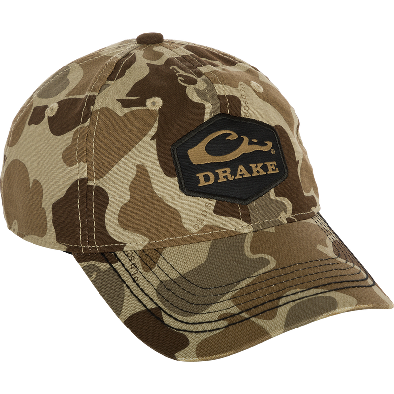 Camo Cotton Twill Hex Patch Cap - A low-profile, breathable hat with a logo patch. Unstructured front panels and a secure hook and loop closure. Perfect for any adventure!