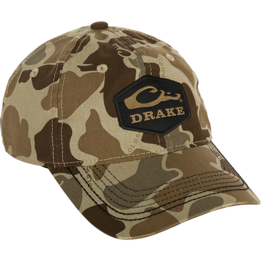Camo Cotton Twill Hex Patch Cap - A low-profile, breathable hat with a logo patch. Unstructured front panels and a secure hook and loop closure. Perfect for any adventure!