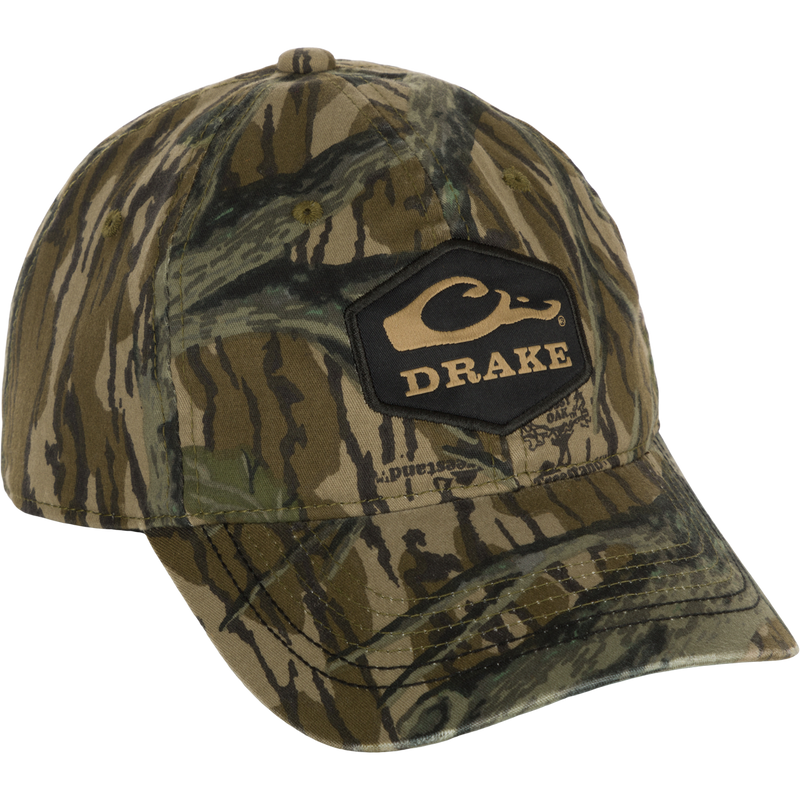 Camo Cotton Twill Hex Patch Cap - A low-profile, breathable hat with a logo patch. Unstructured front panels and hook and loop closure for a secure fit. Ideal for outdoor adventures.