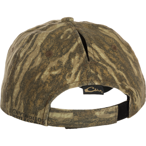 Women's Camo Ponytail Cap: Lightweight cotton/polyester blend cap with unstructured front panels, hook-and-loop closure, and ponytail slot. Ideal for tackling any terrain in style.