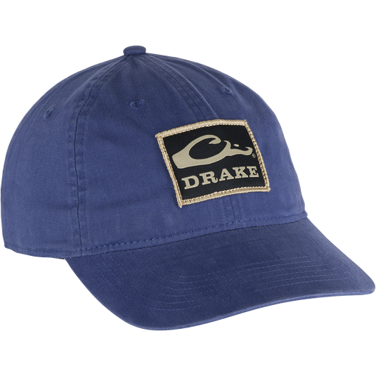A low profile Cotton Twill Patch Cap with a logo on it.