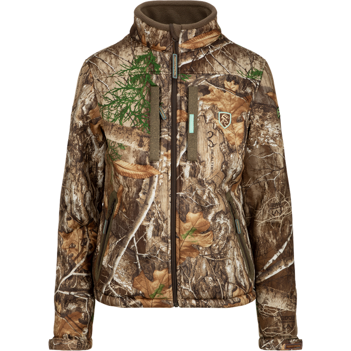 A women's Silencer Full Zip Jacket in full camouflage pattern with Agion Active XL scent control technology, featuring vertical chest pockets and lanyards.