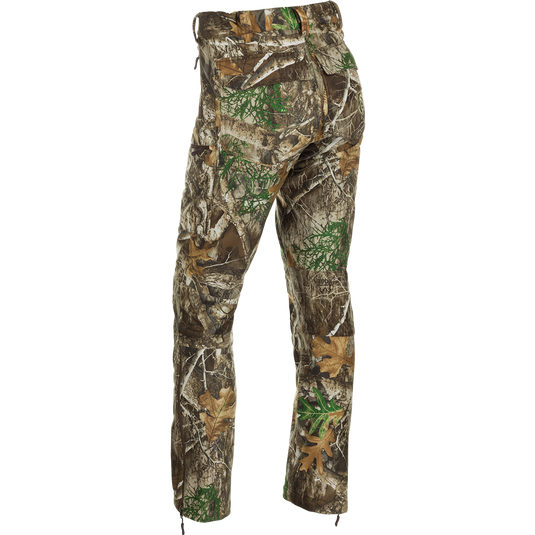 MST Microfleece Softshell Pants - Realtree: Camouflage pants with wind-resistant fabric, 4-way stretch, and moisture-repelling lining. Features scent control technology, comfortable fit, and easy movement. Slash, cargo, and security pockets.