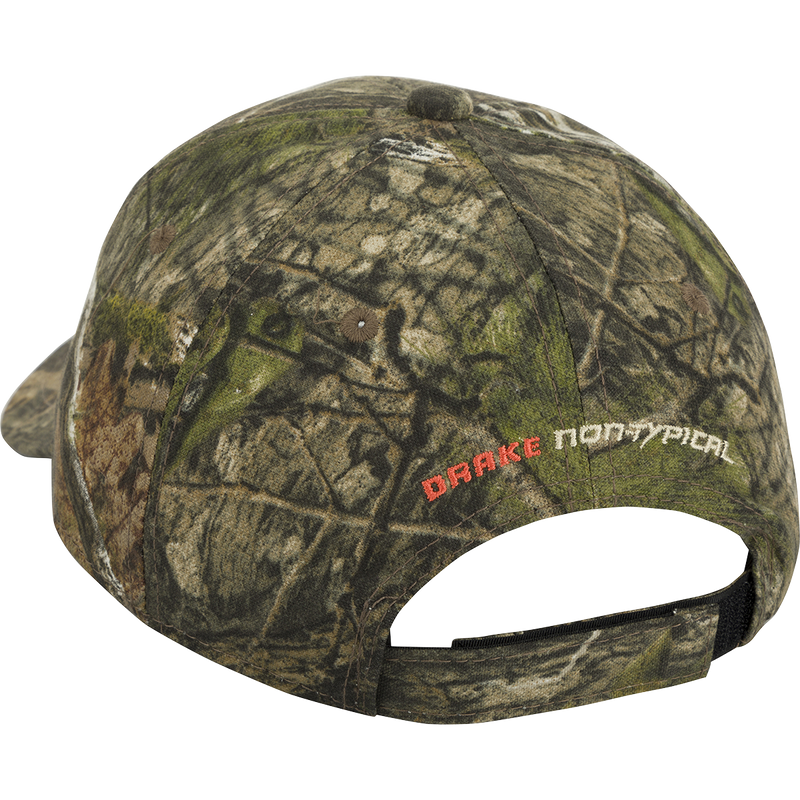 Non-Typical Logo Camo Cotton Cap - Mossy Oak Terra Coyote. A comfortable, adjustable hat made of 100% cotton twill. Features the Non-Typical logo on the front.