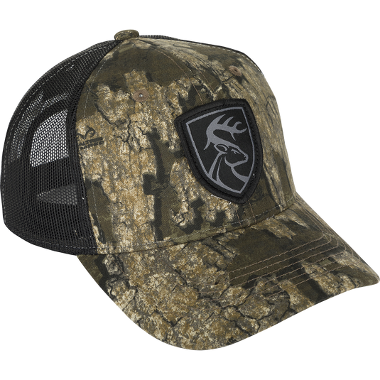 Mesh-Back Patch Logo Cap - Realtree: A camouflage hat with a logo patch featuring a deer head. Made with 100% cotton twill and breathable mesh on the back. Adjustable snap closure.