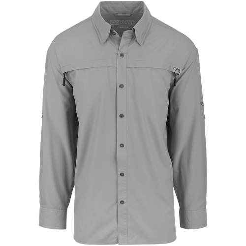 A lightweight, stretchy textured fabric shirt with long sleeves. Made from 100% polyester dobby fabric, it's breathable and moisture-wicking. Perfect for both field and dinner outings. Features UPF 30 sun protection, vented cape back, mechanical stretch fabric, and 2 horizontal zipper pockets. Look sharp in the Town Lake L/S Shirt from Drake Waterfowl.