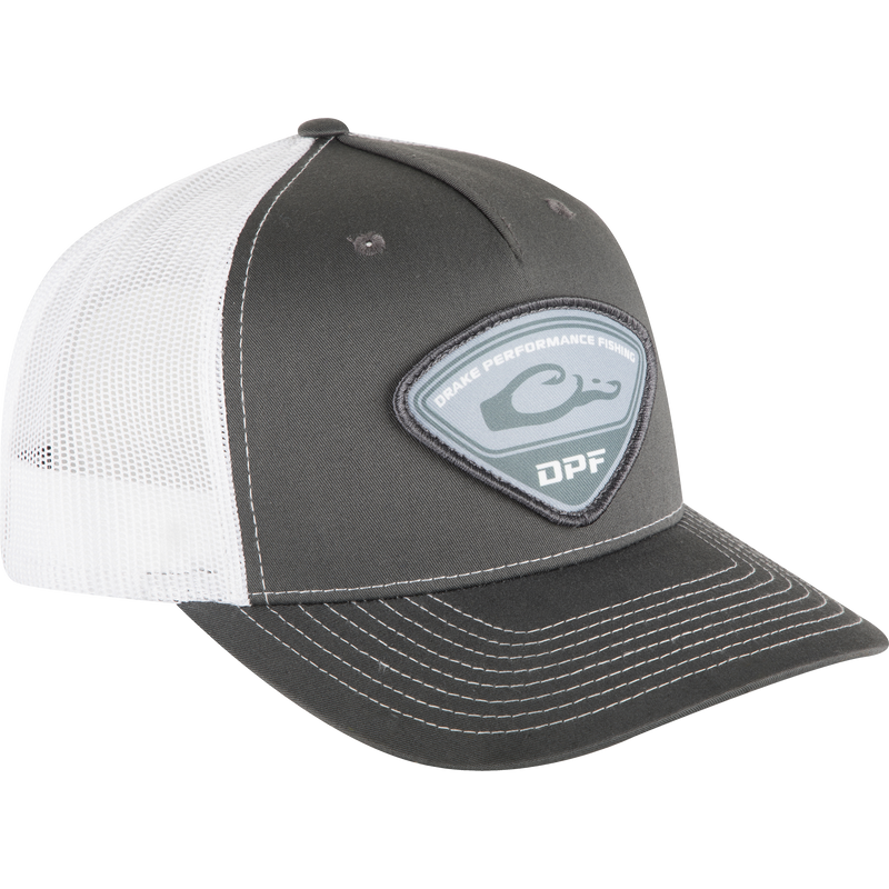 A black and white 5-panel hat with a patch featuring the newly reinvented Drake Fishing logo. Mesh backing for breathability. Snap-back closure for a precise fit.