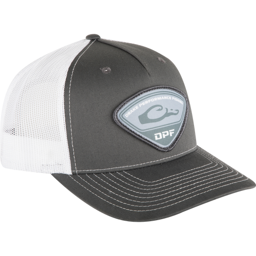 A black and white 5-panel hat with a patch featuring the newly reinvented Drake Fishing logo. Mesh backing for breathability. Snap-back closure for a precise fit.
