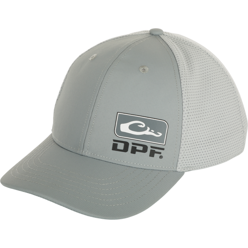 DPF Badge Logo Performance Cap, a structured six-panel hat with a logo on it. Made of polyester ripstop and performance mesh, it offers sun protection and a comfortable fit. Perfect for a day on the water. From Drake Waterfowl's Performance Fishing Series.