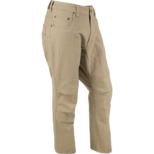A pair of lightweight Canvas Pants made from 100% cotton canvas with reinforced knees and jean-styled metal rivet accents on the pockets.
