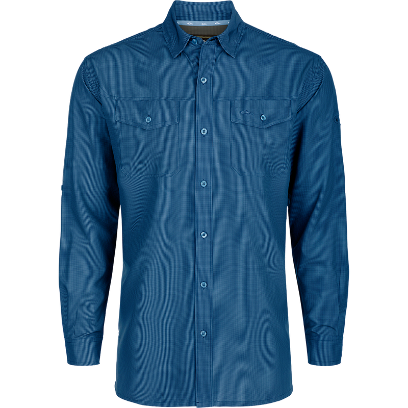 A lightweight, wrinkle-resistant Traveler's Check Shirt L/S with four-way stretch for freedom of movement. Moisture-wicking and breathable, perfect for the man on the go. Two chest pockets with button flaps.
