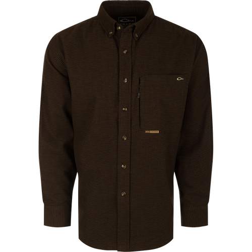 A midweight, long-sleeved houndstooth shirt made from 100% brushed cotton twill. Features a button-down collar, back box pleat, and chest pockets. Perfect for cool weather.