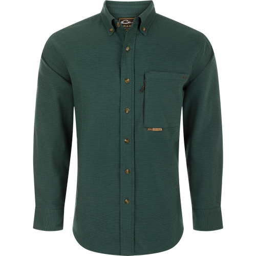 A midweight, long-sleeved shirt made from 100% brushed cotton twill. Features a button-down collar, back box pleat, and chest pockets. Perfect for cool weather.