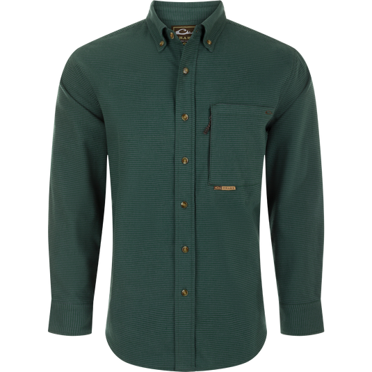 A midweight, long-sleeved shirt made from 100% brushed cotton twill. Features a button-down collar, back box pleat, and chest pockets. Perfect for cool weather.