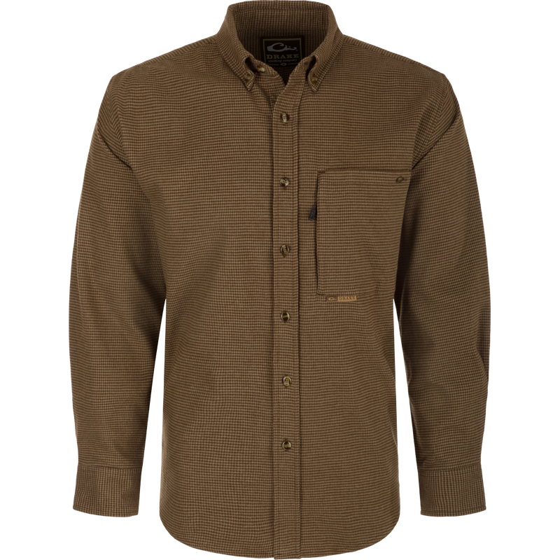 A midweight, long-sleeved shirt crafted from 100% brushed cotton twill. Features a button-down collar, back box pleat, and chest pockets. Perfect for cool weather.