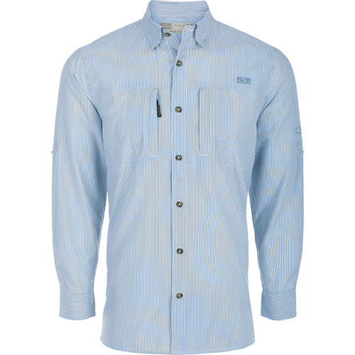 A classic seersucker stripe shirt with a button-down collar, hidden zippered chest pocket, and Magnattach™ closure. Made from performance fabric for moisture-wicking and UPF30 sun protection. Vented cape back and split tail hem for ventilation and versatility. Perfect for hunting, fishing, and casual wear.