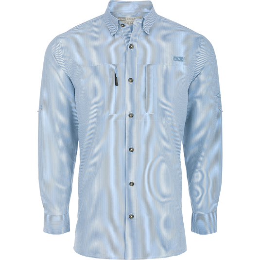 A classic seersucker stripe shirt with a button-down collar, hidden zippered chest pocket, and Magnattach™ closure. Made from performance fabric for moisture-wicking and UPF30 sun protection. Vented cape back and split tail hem for ventilation and versatility. Perfect for hunting, fishing, and casual wear.