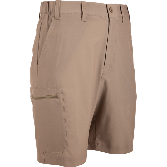 Timber Wolf Khaki Traveler Trek Short: Lightweight, stretchy shorts with zippered pockets and elastic waistband for comfort and functionality.