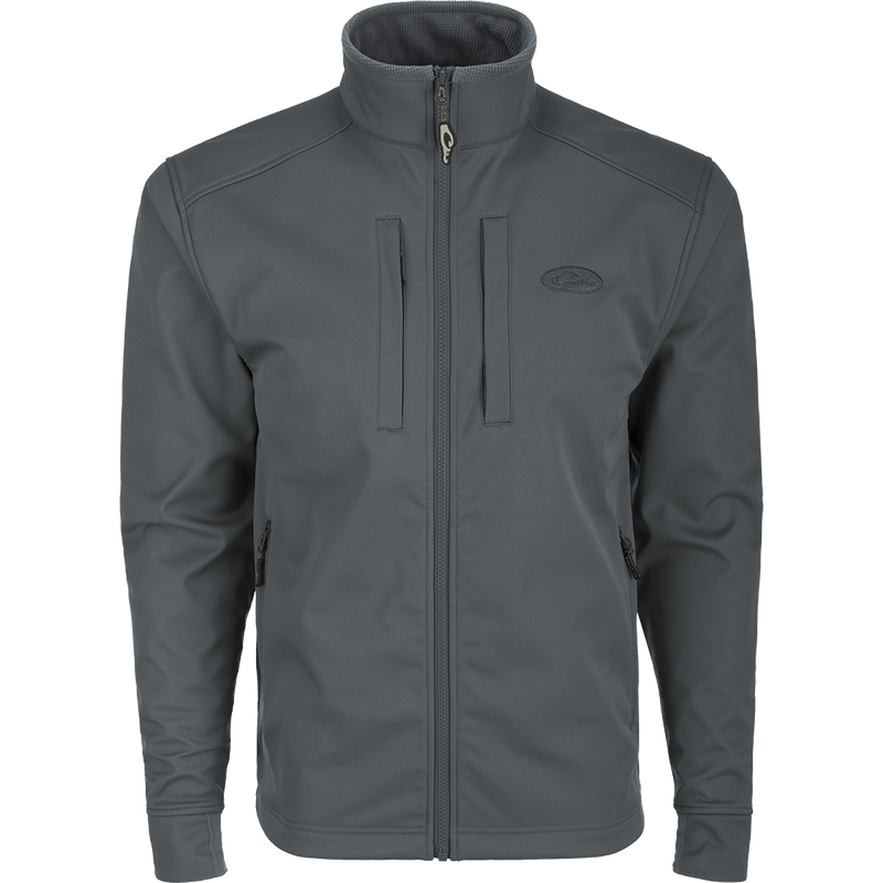 A Windproof Soft Shell Jacket with 4-way stretch and water resistant protection. Features YKK zippered pockets and drawcord waist.