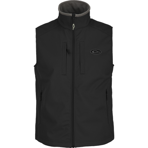 A Windproof Soft Shell Vest with multiple pockets, adjustable waist, and stretch cuffs. 100% polyester shell with bonded grid fleece lining.