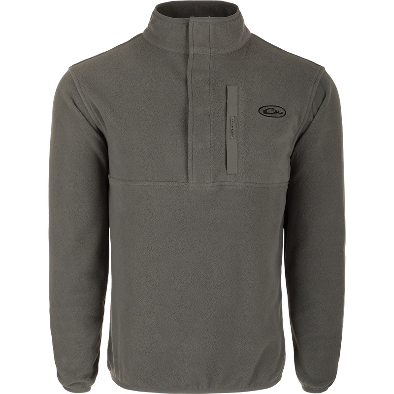 A lightweight, moisture-wicking Camp Fleece Pullover 2.0, perfect for layering with Drake outerwear. Features a neck snap closure and a vertical Magnattach™ chest pocket.