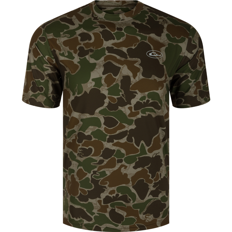 A durable EST Camo Performance Crew S/S shirt with 4-Way Stretch and Shield 4 treatments for sun, heat, odor, and stains. Ideal for hunting and outdoor activities.