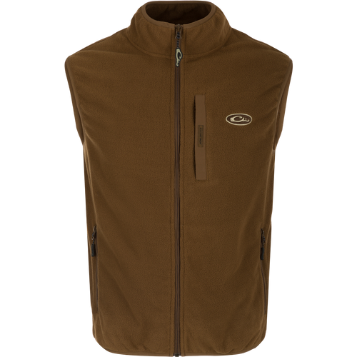 A lightweight, moisture-wicking Camp Fleece Vest with anti-pill treatment. Features vertical Magnattach™ pocket and lower zippered hand warmer pockets. Perfect for layering under your favorite Drake outerwear or for any Spring or Fall outfit.
