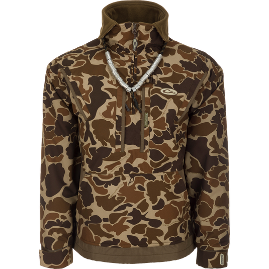 MST Waterproof Fleece-Lined 1/4 Zip Jacket: Versatile camouflage outerwear with adjustable cuffs, extendable collar, and ample storage pockets.