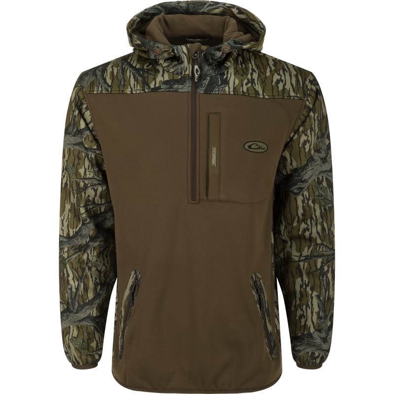 MST Endurance Soft Shell Hoodie: Camouflage jacket with Magnattach™ Call Pocket, zipped lower pockets, mesh-lined sleeves, deep quarter-zip neck, fleece-lined hood with drawstring, and elastic waist hem.