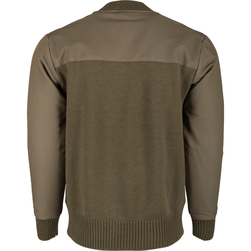 A 1/4 Zip Wool Sweater with a knitted wool lower and a polyester upper treated with DWR for protection. Warm, breathable, and stylish.