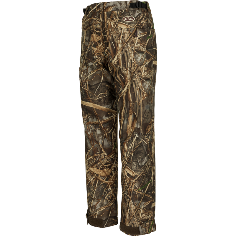 MST Women’s Refuge Bonded Fleece Pants, a pair of camouflage pants with 100% waterproof/windproof/breathable material and fleece lining. Relaxed fit with ankle garters and stirrups.