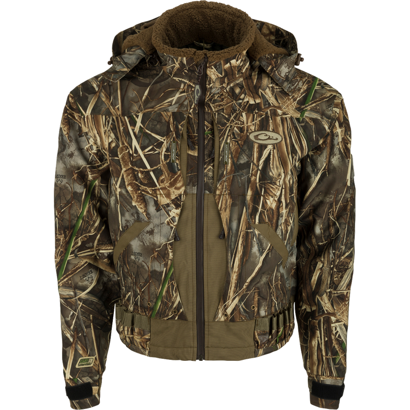 Guardian Elite Flooded Timber Insulated Jacket - Camouflage pattern jacket with body-mapped insulation and multiple pockets for hunters.