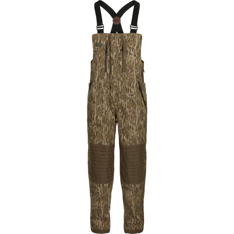 A product image of the EST Guardian Elite™ Bib Shell Weight, with suspenders, perfect for hunters. Made with waterproof/windproof/breathable fabric and reinforced knees.
