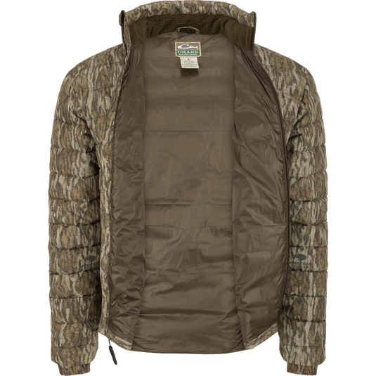 LST Double Down Layering Full Zip - Realtree jacket with label, bag, and logo details. Insulated with 100% Polyester Synthetic Down. Microfleece-lined collar for warmth. Improved fit and range of motion. Zippered pockets and adjustable waist for a secure fit.