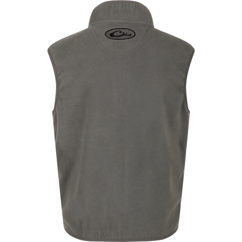 A grey Youth Camp Fleece Vest with logo, anti-pill treatment, moisture-wicking properties, Magnattach pocket, and zippered handwarmer pockets.