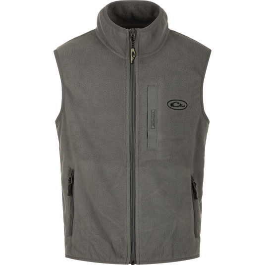 Youth Camp Fleece Vest with zipper and pockets, made from durable 100% Polyester and 210g Micro Fleece. Anti-pill treatment, moisture-wicking, and Magnattach pocket for secure storage.