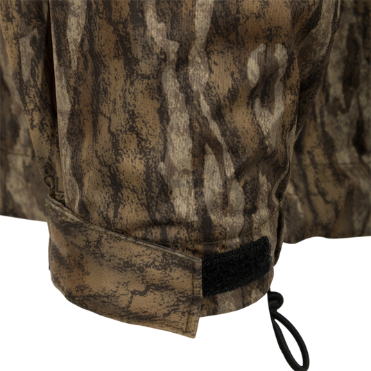 A close-up of the Ultralight Packable Rain Jacket, a waterproof/windproof jacket for turkey season. Easily fits in your vest with a pack size of 7.5" X 4". 100% waterproof/windproof & breathable, keeping you dry during spring showers.