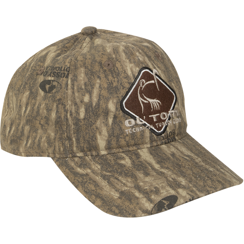 Camo Cotton Ol' Tom Diamond Logo Cap, a mid-profile fit hat with a logo on it. 100% cotton panels, structured front panels, and hook & loop back closure.