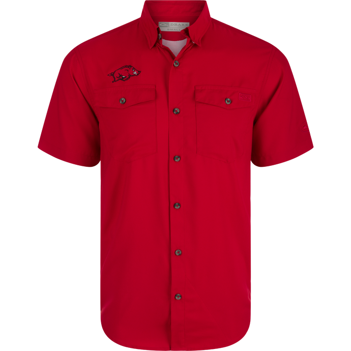 Arkansas Frat Dobby Solid Short Sleeve Shirt: Red shirt with logo and pig design, hidden button-down collar, vented cape back, and two chest pockets. Lightweight, moisture-wicking fabric with UPF30 sun protection.