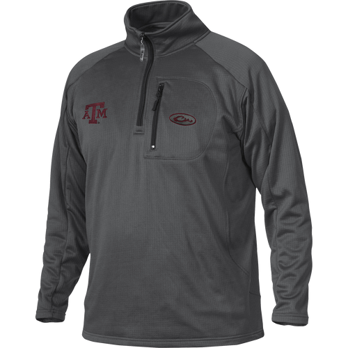A grey jacket with Texas A&M logo embroidery on the right chest, perfect for active outdoorsmen. Made of 100% polyester with 4-way stretch and square check fleece backing for comfort and breathability. Features a vertical front chest zippered pocket.