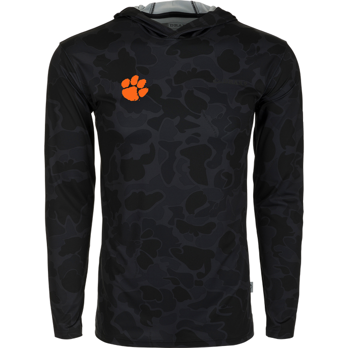 Clemson Performance Long Sleeve Camo Hoodie - A versatile black hoodie with an orange paw print, delivering exceptional functionality with cooling, stretch, and moisture-wicking features. Perfect for all-year wear in various weather conditions.