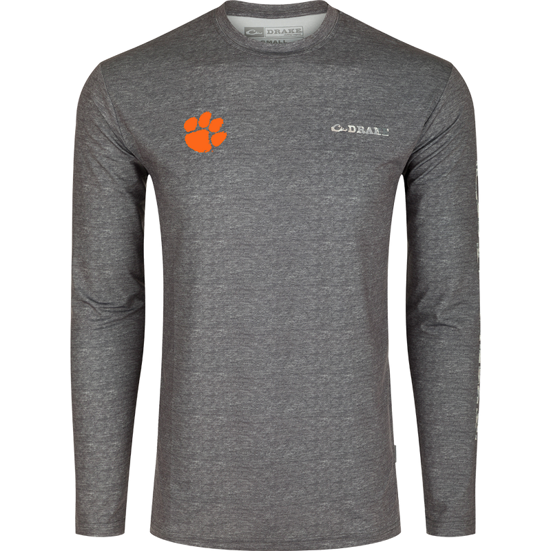 Clemson Performance Heather Long Sleeve Crew: A grey shirt with an orange paw print, designed for exceptional functionality and performance. Lightweight, moisture-wicking, and quick-drying fabric with UPF 50 sun protection. Perfect for all-year wear in various weather conditions.
