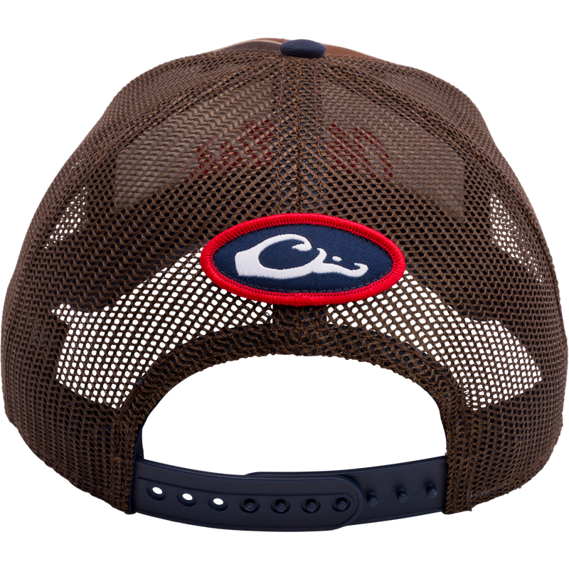 A Drake Waterfowl Ole Miss Old School Cap featuring exclusive Old School Original Camo pattern, structured crown, X-Peak visor, and embroidered college logo. Snap-back closure for adjustability.