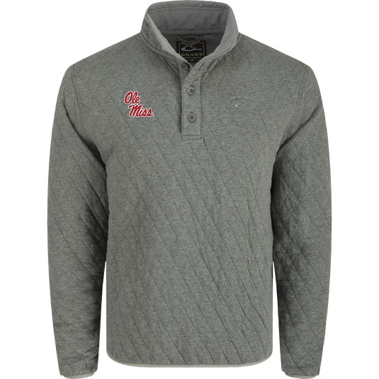 A grey Delta Quilted 1/4 Snap Sweatshirt with an embroidered team logo, made from 100% brushed BCI Cotton. Midweight at 350 GSM, it features a Polyester Fill Diamond Quilting for added warmth. Perfect for cool Autumn days.