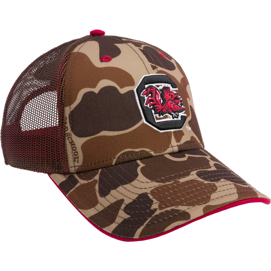 South Carolina Old School Cap: Camouflage hat with red and black logo, mesh back panels, structured crown, X-Peak visor, 3D embroidered college logo, snap-back closure. From Drake Waterfowl's Collegiate Series.