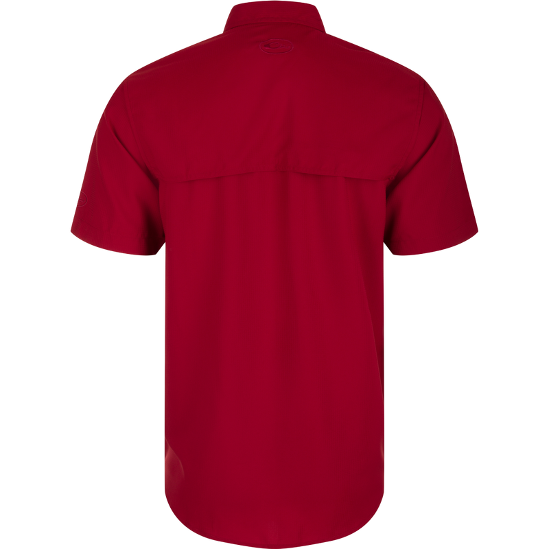 South Carolina Frat Dobby Solid Short Sleeve Shirt, a performance shirt with built-in stretch, UPF 30 sun protection, and moisture-wicking capabilities. Classic fit with hidden button-down collar and vented cape back.
