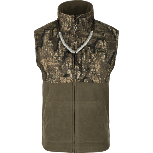 MST Women's Eqwader Vest, featuring a tree pattern, waterproof shoulders, and breathable fleece lower torso. Perfect for outdoor activities.