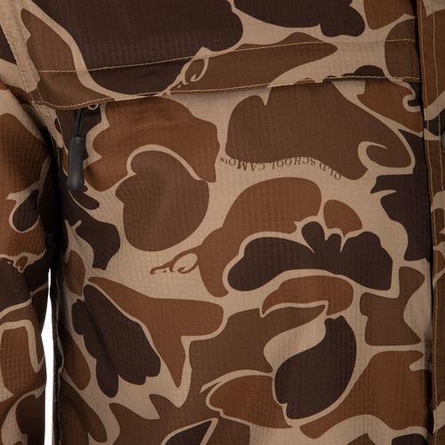 8-Shot Flyweight L/S Shirt: Close-up of jacket with Old School Camo pattern, hidden button-down collar, and vented cape back. Chest pockets with hidden zippers.